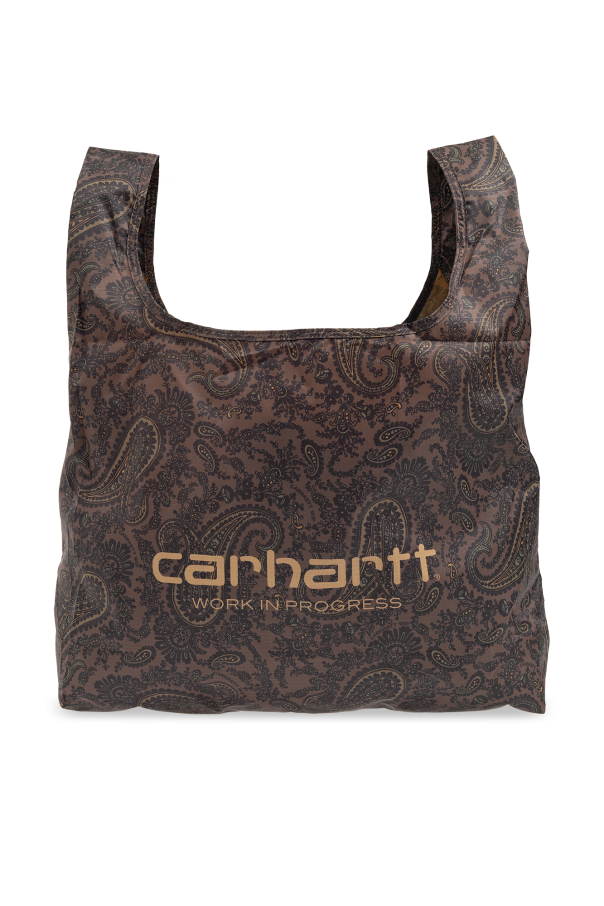 Carhartt WIP Shopper bag | A fur accessory peeks out of an Hermès